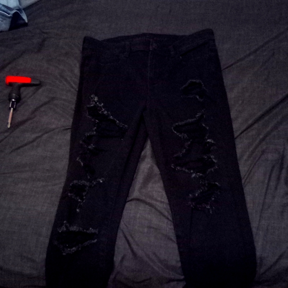 Ripped black jeans graphic jeans
